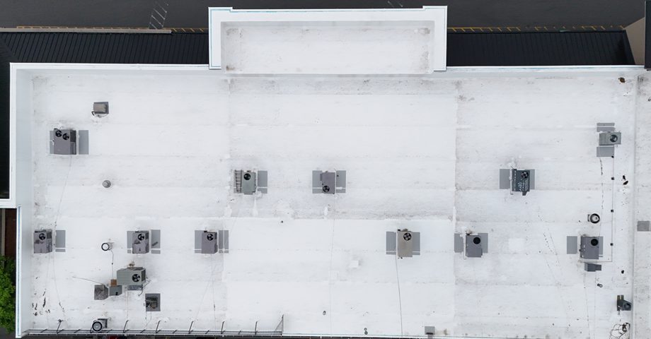 White PVC membrane roof on a commercial building